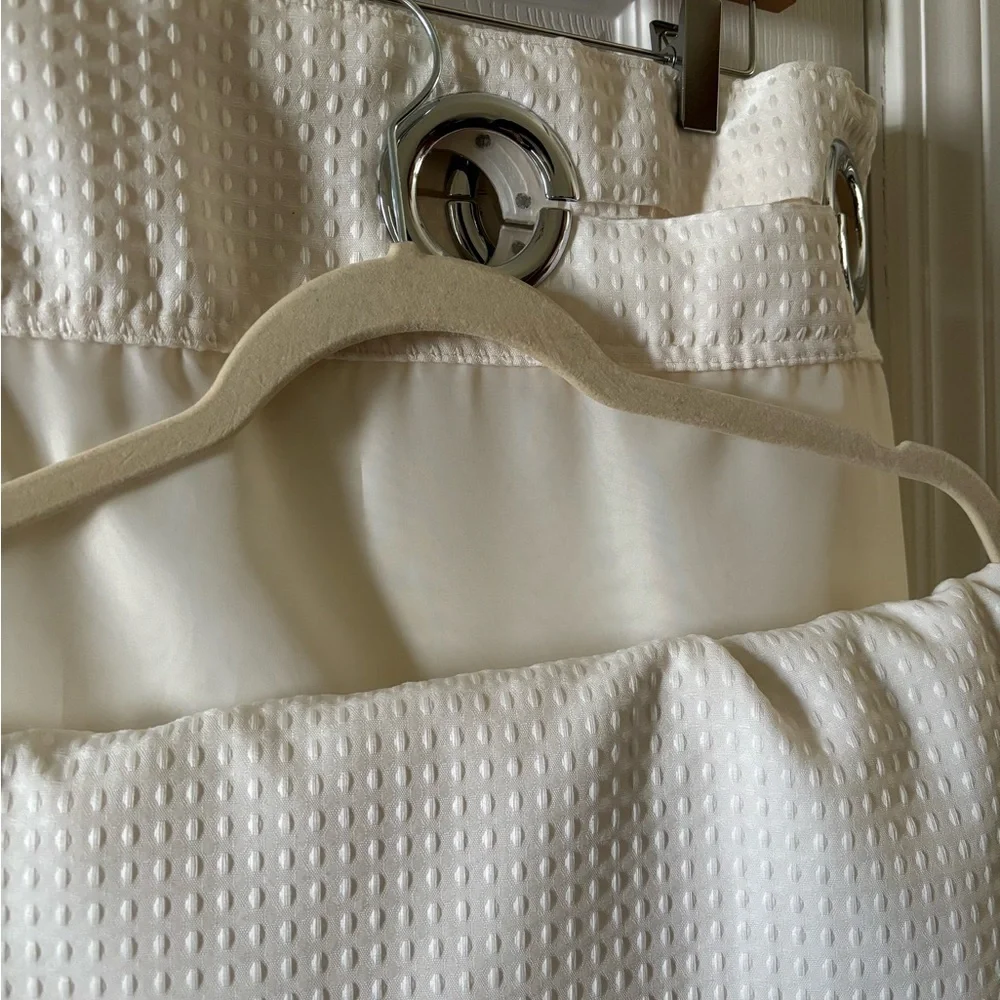 Cream colored shower curtain never used lined with waffle fabric bottom